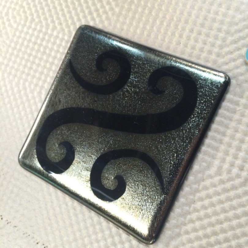 Sandblasted swirls on gold irid