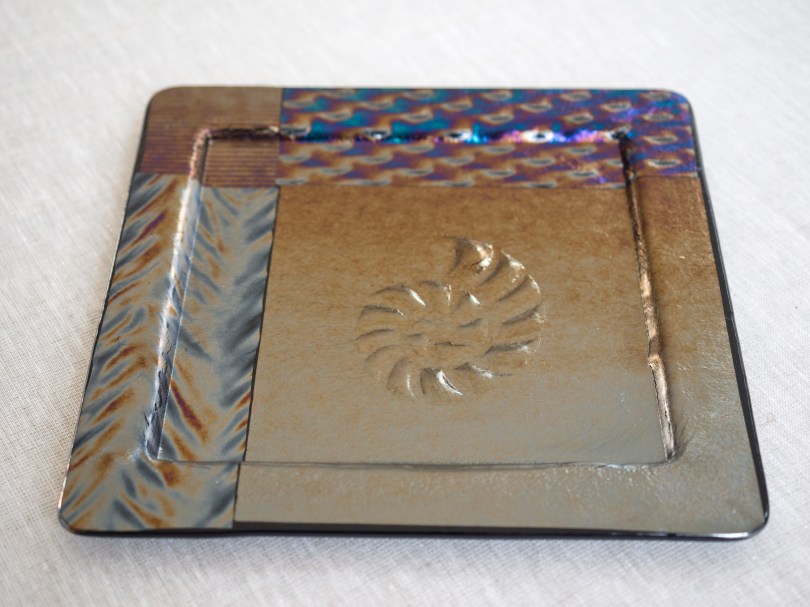 Hand-carved nautilus design