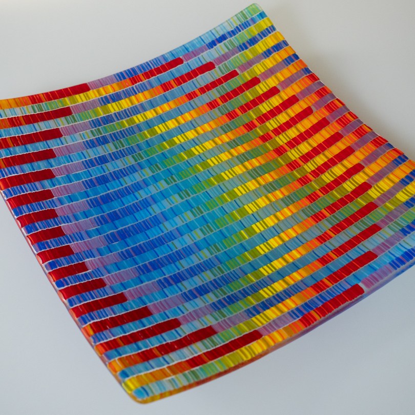Rainbow tapestry dish (12x12") by The Purple Kiln